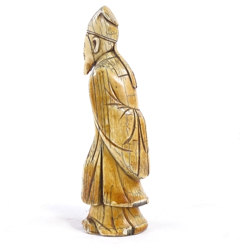 90 - A Chinese carved ivory sage figure, 18th/19th century, height 20cm.