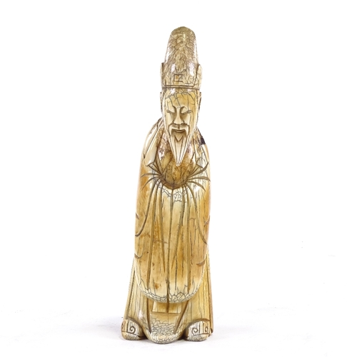 91 - A Chinese carved ivory sage figure, 18th/19th century, height 20cm.