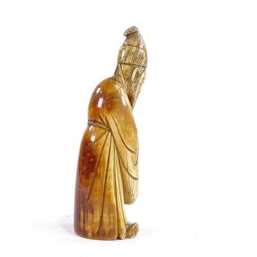 91 - A Chinese carved ivory sage figure, 18th/19th century, height 20cm.