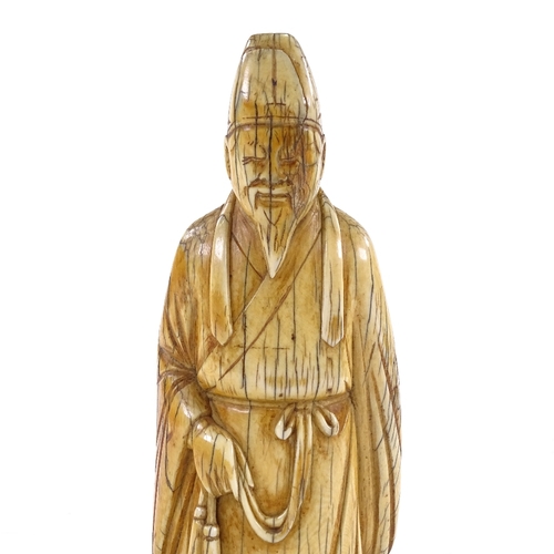 92 - A Chinese carved ivory sage figure, 18th/19th century, height 17cm.