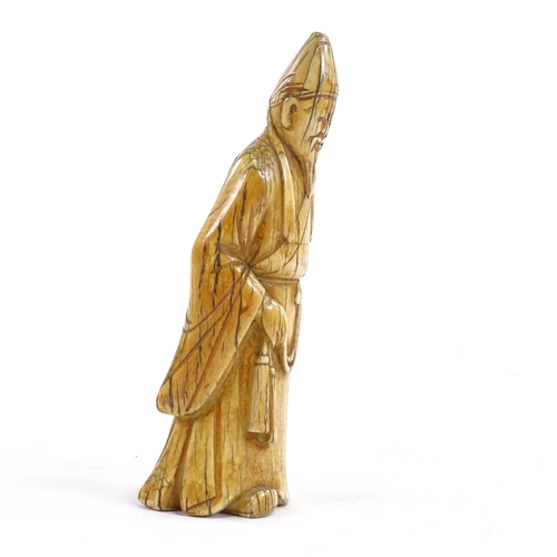 92 - A Chinese carved ivory sage figure, 18th/19th century, height 17cm.