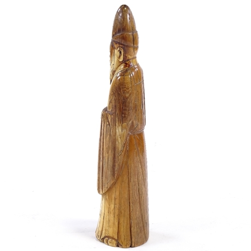 94 - A Chinese carved ivory sage figure,  18th/19th century, height 18cm.