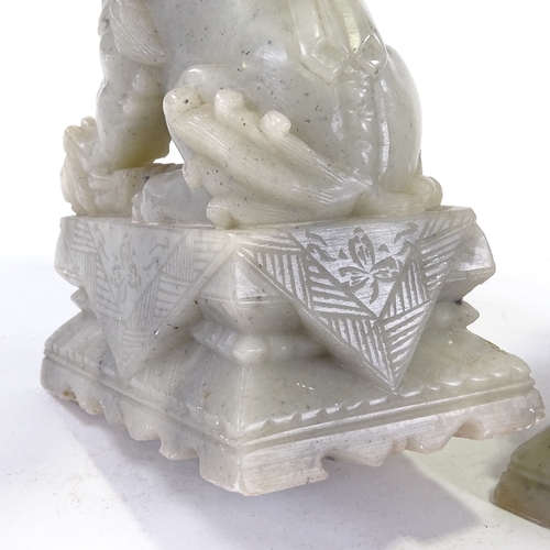 98 - A pair of Chinese carved soapstone Dogs of Fo, height 17cm.