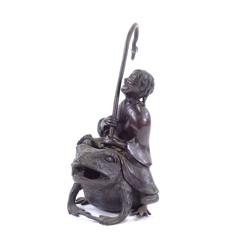 101 - A Chinese patinated bronze sculpture of a man riding a toad, height to man's head 16cm