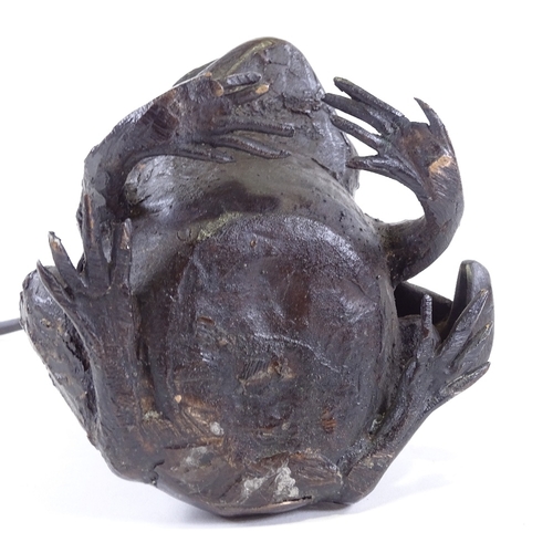 101 - A Chinese patinated bronze sculpture of a man riding a toad, height to man's head 16cm