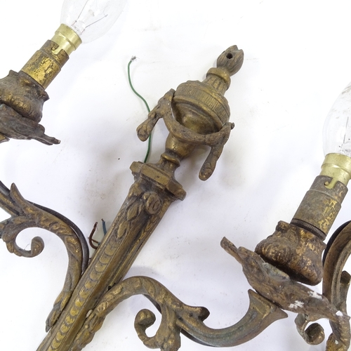 104 - A pair of gilt-brass Adam style twin-branch wall light fittings, circa 1900, height 40cm