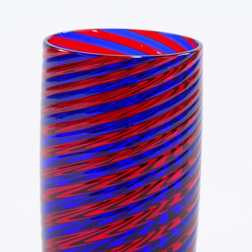 106 - A blue and red glass spiral hand made cylinder vase, height 17cm.