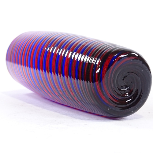 106 - A blue and red glass spiral hand made cylinder vase, height 17cm.