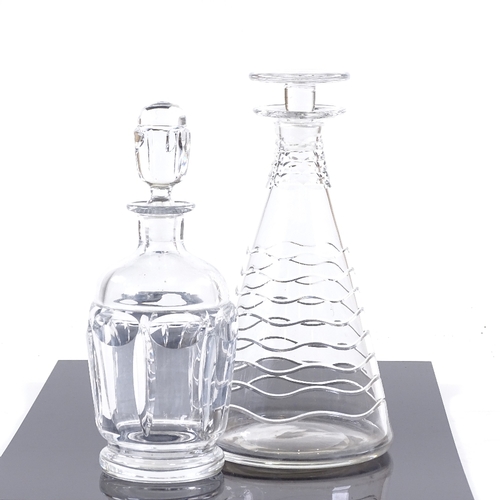 107 - Two 20th century stylised glass decanters, tallest 25cm.