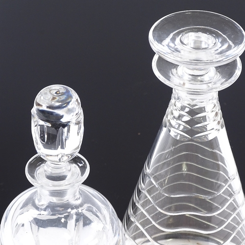 107 - Two 20th century stylised glass decanters, tallest 25cm.