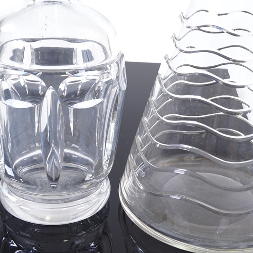 107 - Two 20th century stylised glass decanters, tallest 25cm.