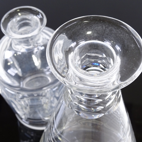 107 - Two 20th century stylised glass decanters, tallest 25cm.