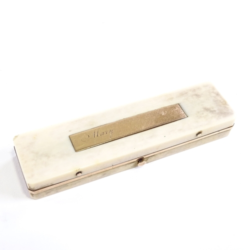 125 - A Georgian ivory toothpick case, with unmarked gold mounts and hidden hair panel, length 9cm.