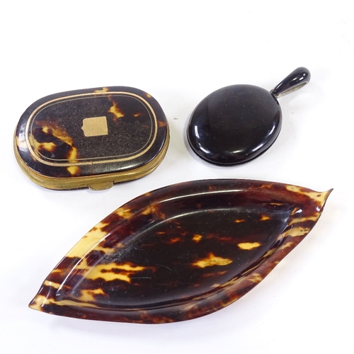 126 - A small tortoishell purse, together with a tortoishell pendant locket and pin tray, tray length 13cm... 