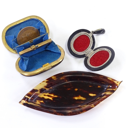 126 - A small tortoishell purse, together with a tortoishell pendant locket and pin tray, tray length 13cm... 