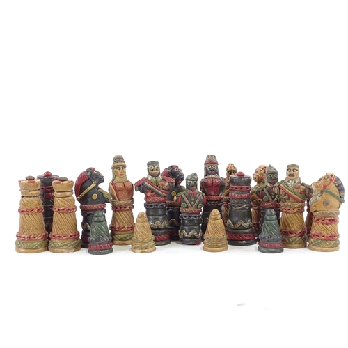 129 - Modern Mexican chess pieces.