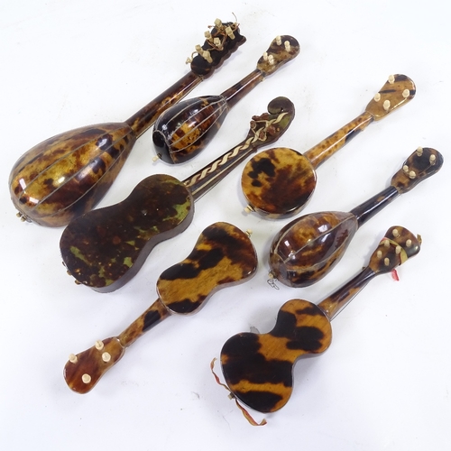55 - 7 Italian tortoishell and mother of pearl minature instruments, largest length 21cm.