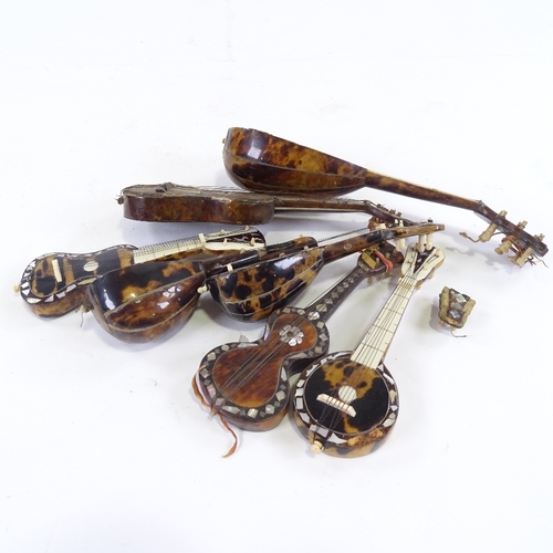 55 - 7 Italian tortoishell and mother of pearl minature instruments, largest length 21cm.