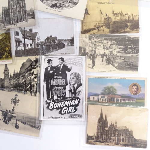 56 - A group of early 20th century postcards, including Steiff