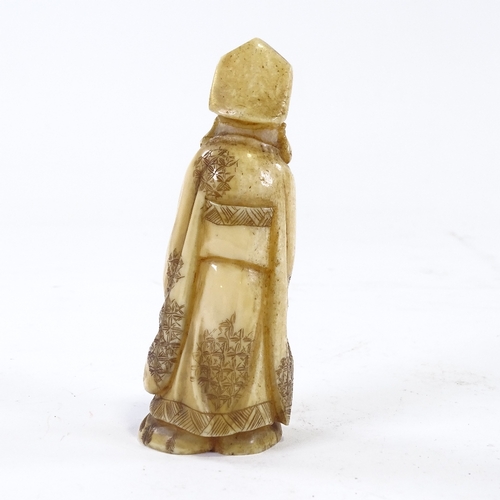 61 - A carved ivory okimono, Sage figure with hare, height 11cm.