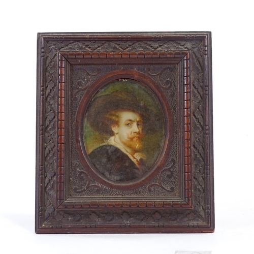 62 - A 19th century miniature painted portrait on ivory, depicting a man wearing a wide brimmed hat, unsi... 