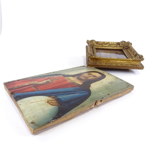 64 - A 19th/20th century painted Russian icon on wood panel, together with a wood carved Christ in gilt f... 