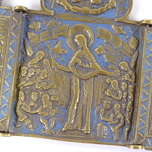 67 - A Russian relief cast bronze triptych icon with blue enamel decoration, height 10cm