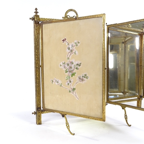 78 - 3 fold dressing table mirror, with ornate brass frame, bakelite panel have moulded and painted decor... 