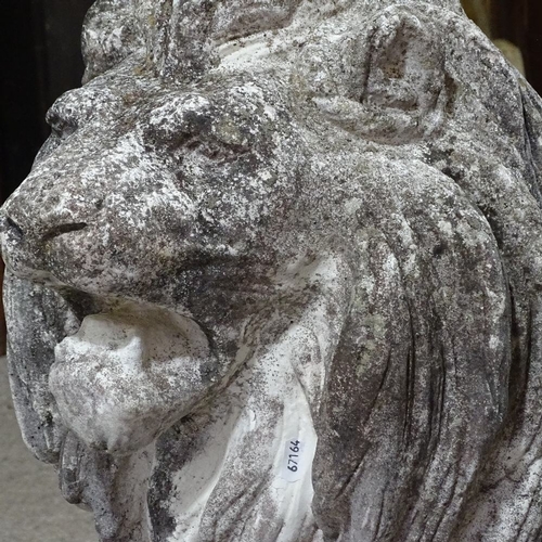 115 - A large-scale weathered concrete garden statue of a lion, overall height 94cm