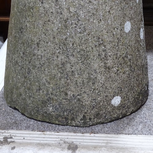 117 - A weathered stone saddle stone, height 74cm, diameter 41cm