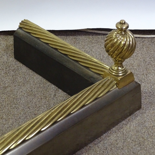 37 - A 19th/20th century steel and brass fire kerb, length 138cm depth 37cm.