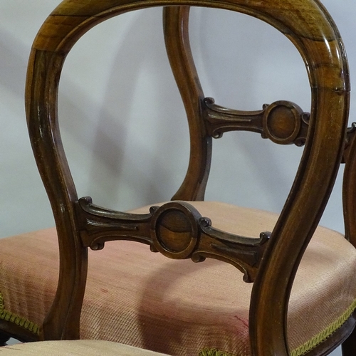 80 - A set of 6 19th century rosewood balloon back dining chairs.