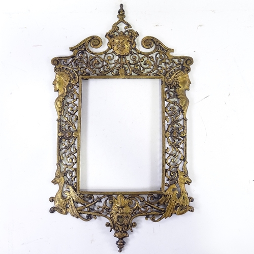 1237 - A 19th century cast and pierced gilt-brass frame, inside measurements 9