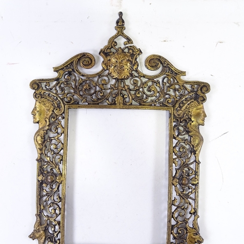 1237 - A 19th century cast and pierced gilt-brass frame, inside measurements 9