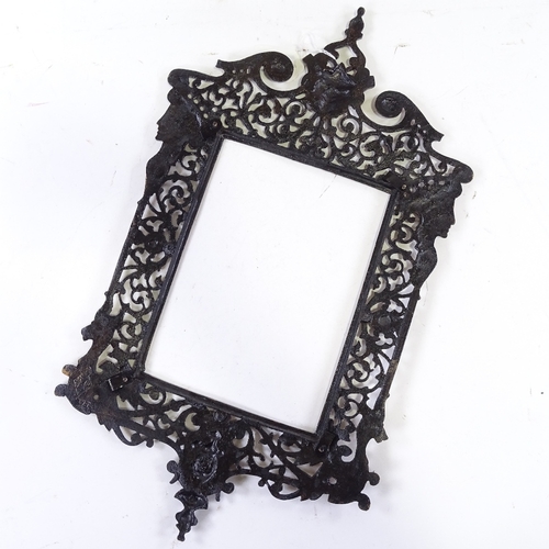 1237 - A 19th century cast and pierced gilt-brass frame, inside measurements 9