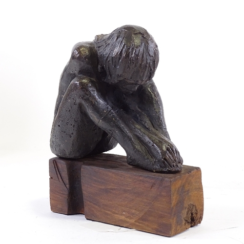 1259 - Clive Fredriksson, bronze patinated composition seated figure on wood plinth, overall height 8.5