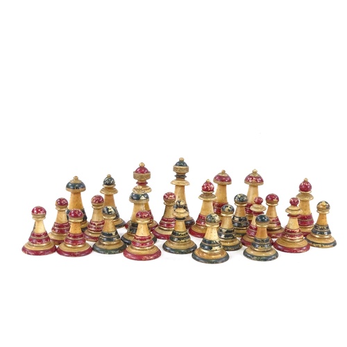 130 - An 19th century Ottoman ivory chess set, in abstract form, tallest 5cm.