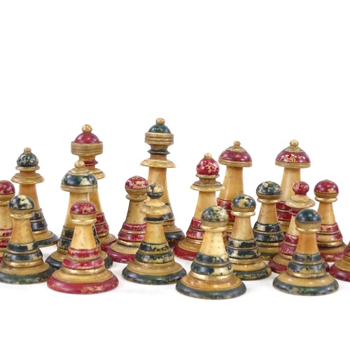 130 - An 19th century Ottoman ivory chess set, in abstract form, tallest 5cm.