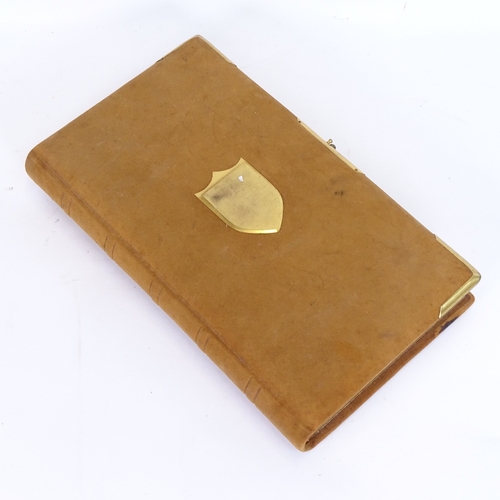 13 - A Victorian felt-bound family photograph album, gilt-metal mounts and mostly full, album length 35cm