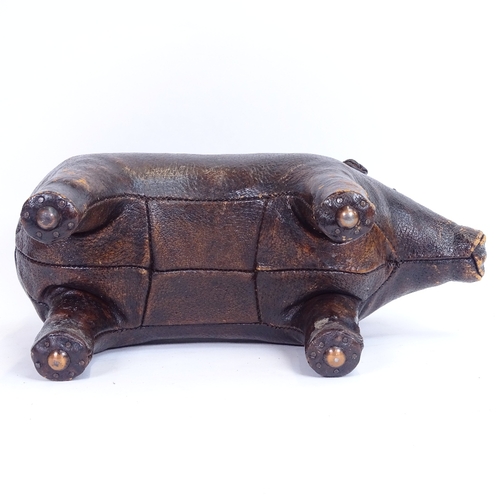 25 - A leather-covered model pig footrest purchased from Liberty's in the 1960s, length 47cm impressed  L... 