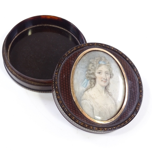 180 - A fine early 19th century circular lacquer box with painted crosshatch design, the lid having an ins... 