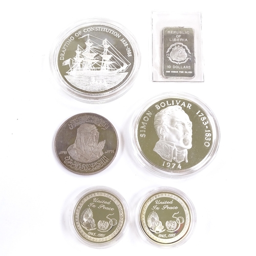 102 - Pitcairn Islands silver 50 dollar coin 1988, cased, Panama silver 20 balboas coin 1974, and encapsul... 