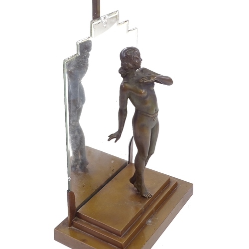 12 - Art Deco bronze patinated spelter table lamp in the form of a naked dancer, unsigned, on stepped gil... 