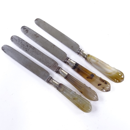 182 - A set of 4 early 19th century carved agate-handled knives, with silver armorial collars, by Verinder... 