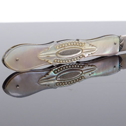 184 - A Victorian carved mother-of-pearl and silver fruit knife, hallmarks Sheffield 1862, length closed 9... 