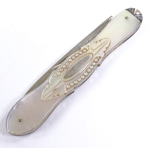 184 - A Victorian carved mother-of-pearl and silver fruit knife, hallmarks Sheffield 1862, length closed 9... 