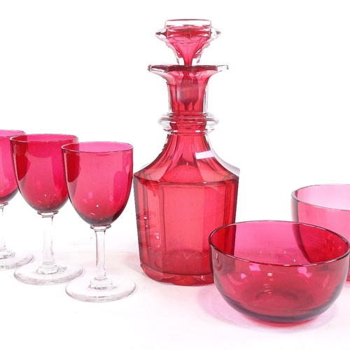 190 - A group of Victorian cranberry glass, comprising an octagonal decanter, height 23cm, 2 bowls, 11cm a... 