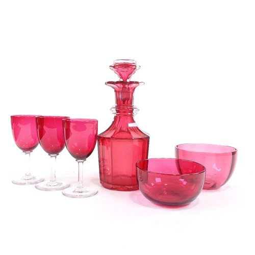 190 - A group of Victorian cranberry glass, comprising an octagonal decanter, height 23cm, 2 bowls, 11cm a... 