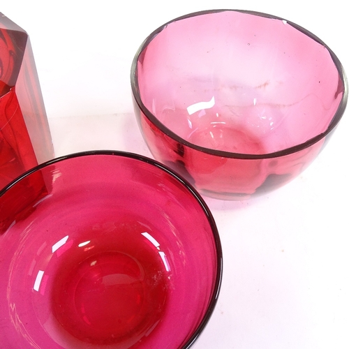 190 - A group of Victorian cranberry glass, comprising an octagonal decanter, height 23cm, 2 bowls, 11cm a... 