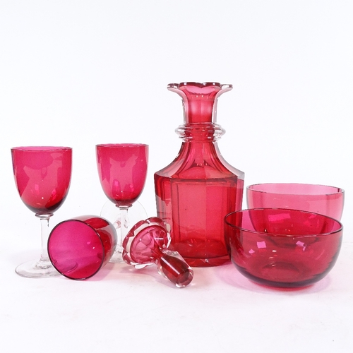 190 - A group of Victorian cranberry glass, comprising an octagonal decanter, height 23cm, 2 bowls, 11cm a... 